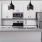 a kitchen with white cabinets a stovetop a fridge and a sink