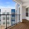 balcony with a couch and chairs