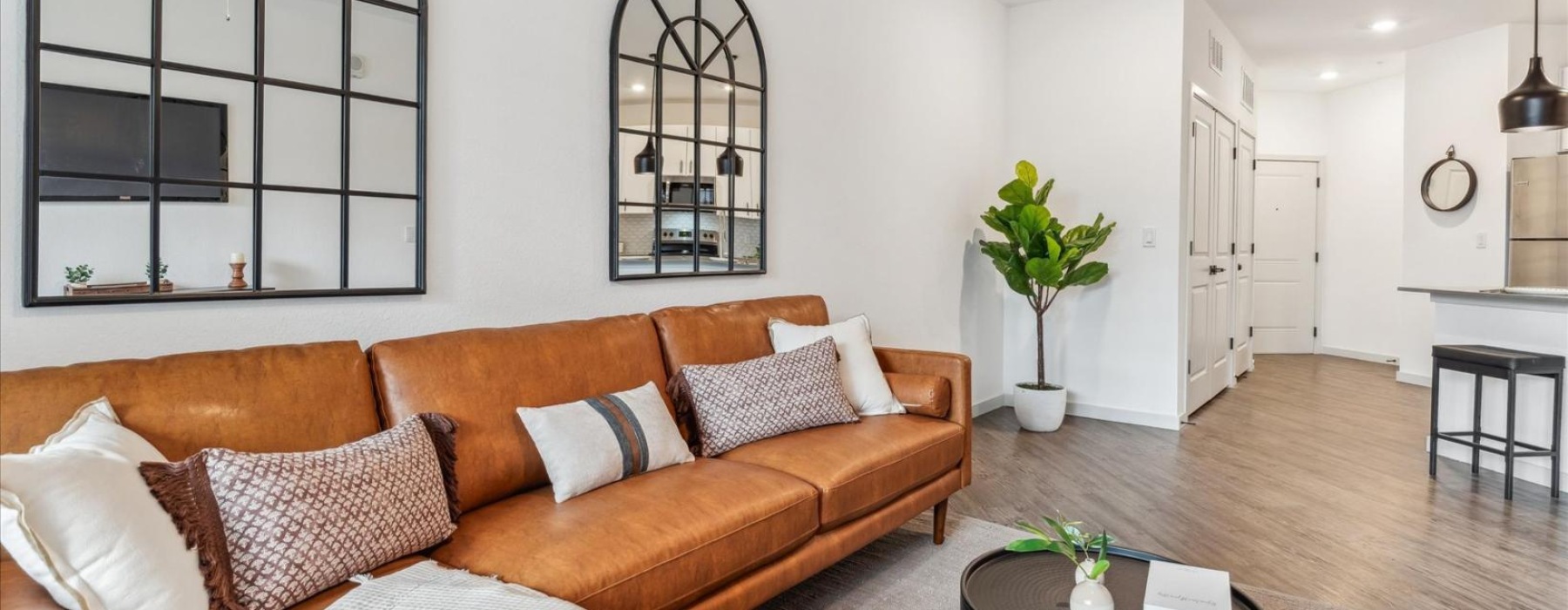 a living room with a couch and a table