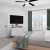 bedroom with a bed and table  and tv and windows window