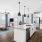 a kitchen island and a living room beyond it