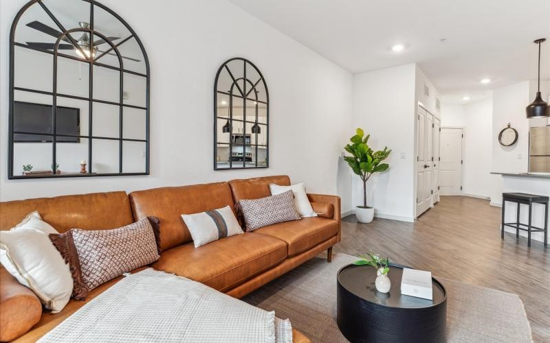 a living room with a couch and a table